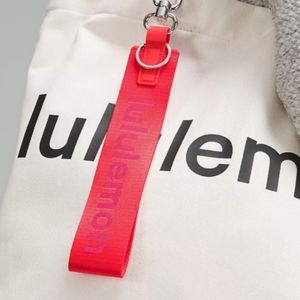 NET Lululemon Never Lost Key Chain in Love Red/Sonic Pink